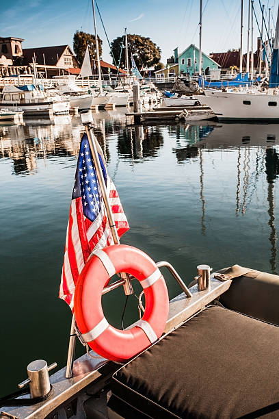 istock Yacht with American flag At The Pier 482555497