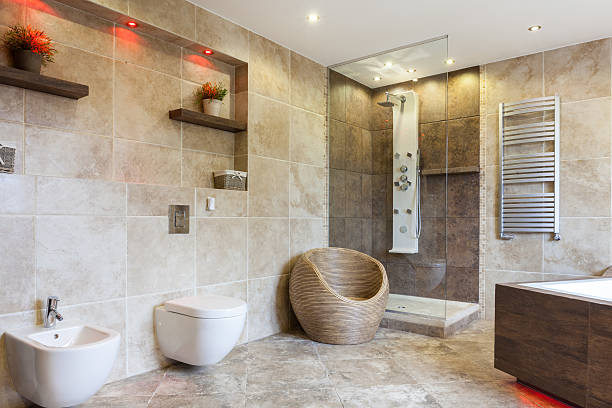 istock Luxury bathroom with beige tiles 482555630