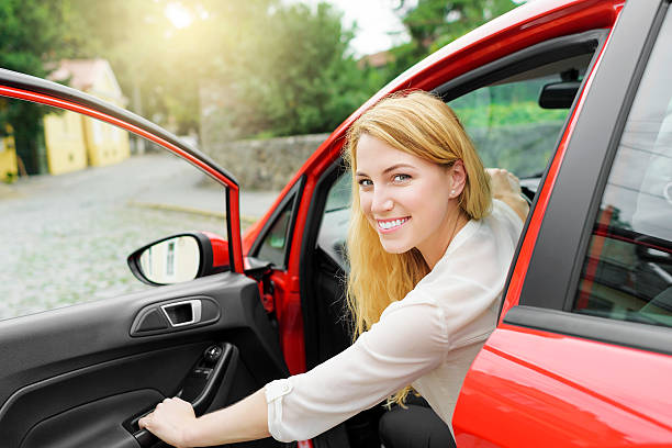 istock Blonde woman in the car 482555728