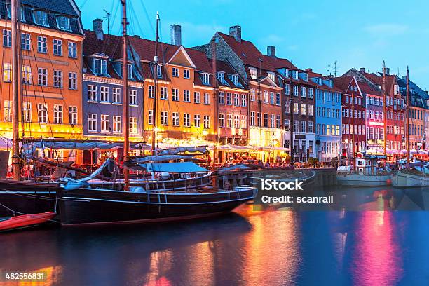 Evening Scenery Of Nyhavn In Copenhagen Denmark Stock Photo - Download Image Now - Copenhagen, Night, Architecture