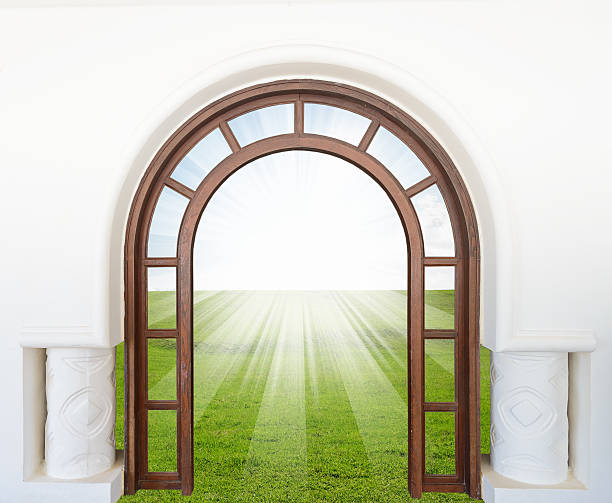 istock open door and a winter forest 482557213