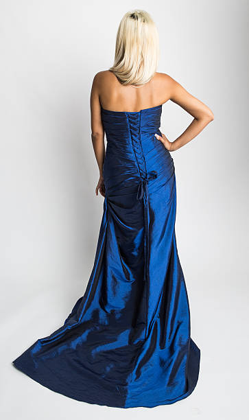 istock Woman in blue dress 482557351