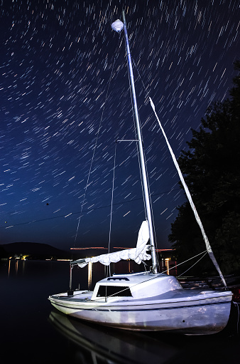 Sailboat on lake Sep-Iles (Portneuf) with long exposure of star