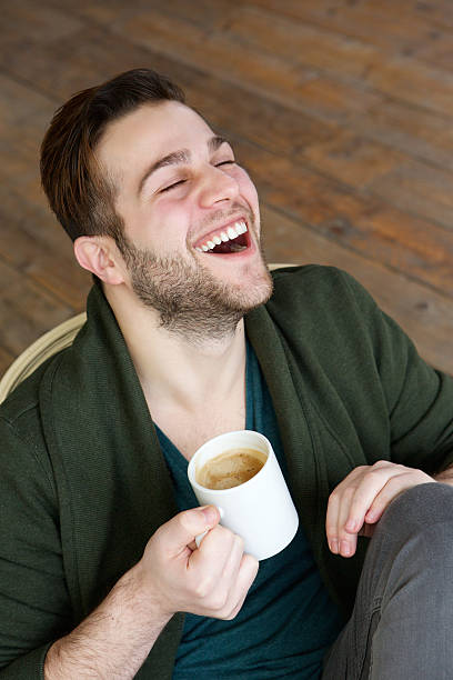 istock Man relaxing at home with cup of coffee 482559593