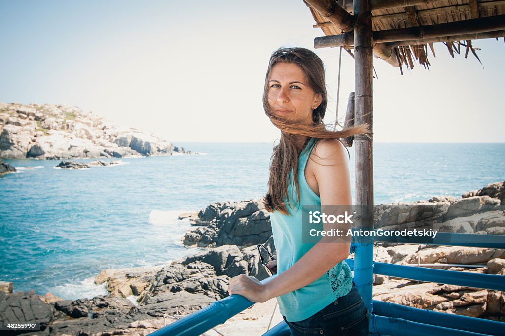 The island of swallows photo beautiful girls Beach Stock Photo