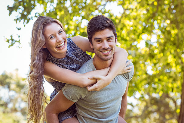 istock Cute couple in the park 482560590