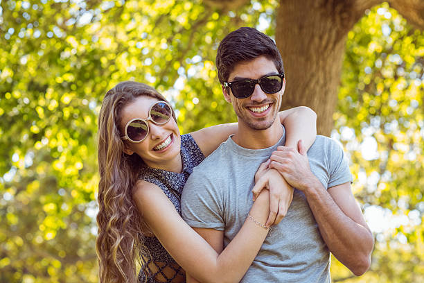 istock Cute couple in the park 482560594