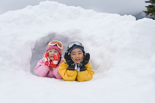 Snow hut and kids