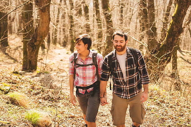istock couple hiking on the wood 482560983