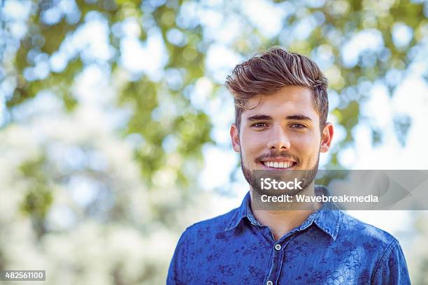 Handsome Hipster Looking At Camera Stock Photo - Download Image Now - 20-24 Years, 20-29 Years, Males