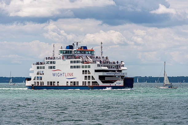 Portsmouth, UK - July 25, 2015: A Wight Link car ferry sailing across the Solent between Portsmouth and the Isle of Wight shown on July 25, 2015 in Portsmouth, UK