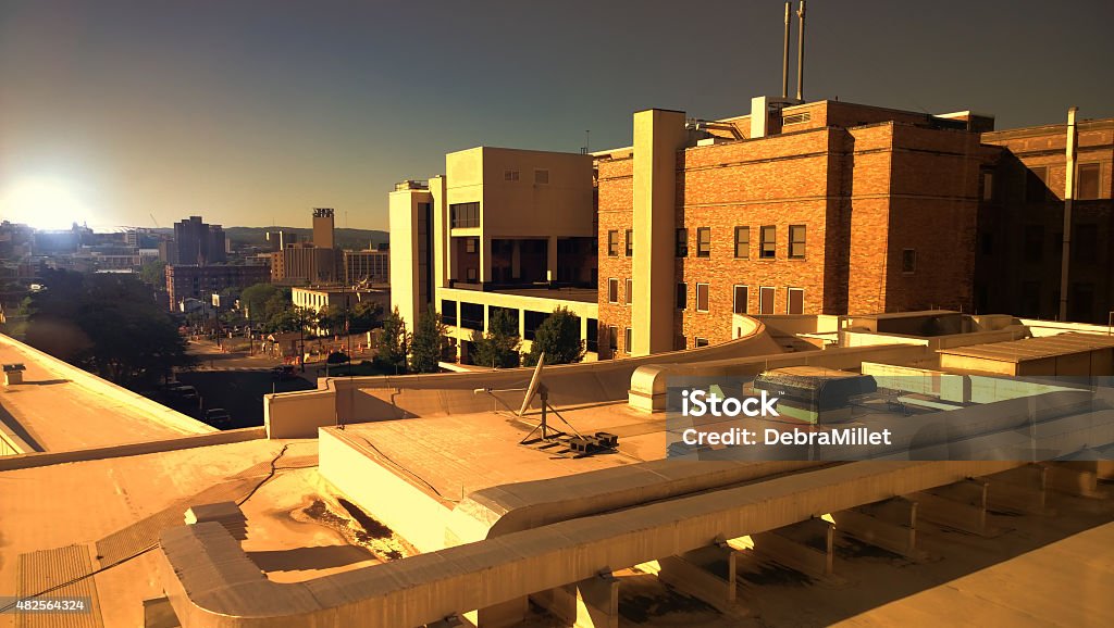 city at sundown rooftop view of buildings and city at sundown Hospital Stock Photo