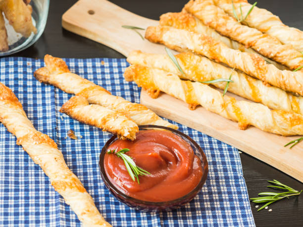 istock Food. Homemade baking. Bread products. Cheese bread sticks. 482566494
