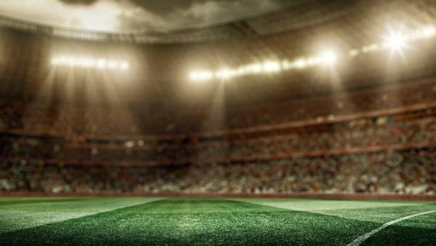 istock Stadium lights shining down on soccer field 482566941