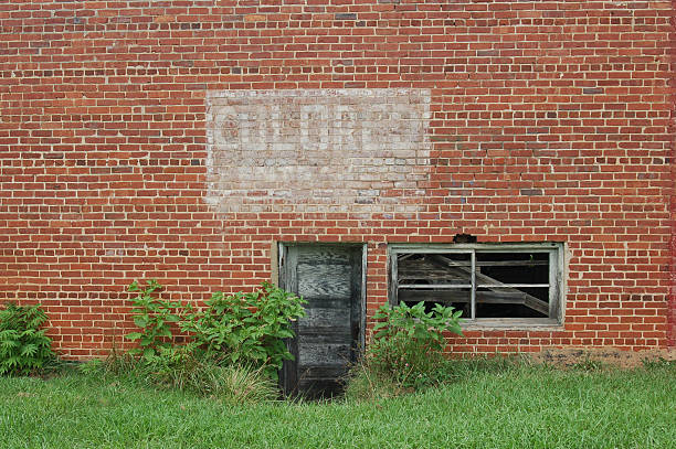 Sign from the past showing racism The side of this building shows a sign from the past stating Colored Entrance.  It was from a time where African Americans were not allowed to enter the same entrance as whites. segregation stock pictures, royalty-free photos & images