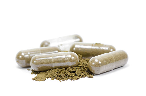 istock Close up andrographis paniculata herbal antipyretic capsules isolated on white 482570901