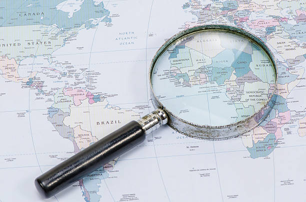 istock Magnifying Glass in front of a New York map 482571531