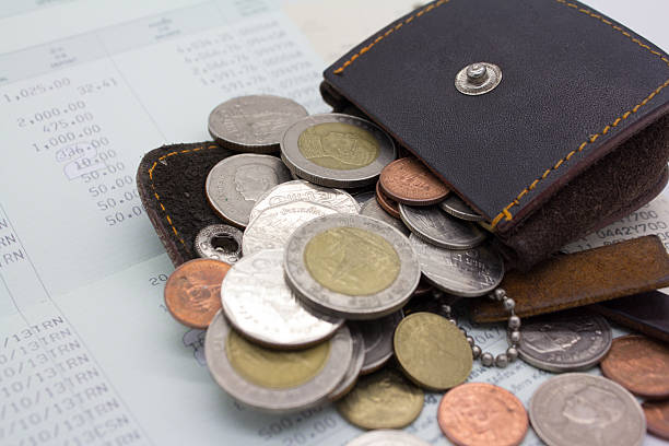 istock money bag and coins 482572689