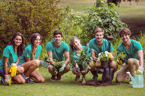 istock Happy friends gardening for the community 482573778
