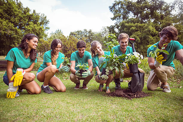 istock Happy friends gardening for the community 482573788