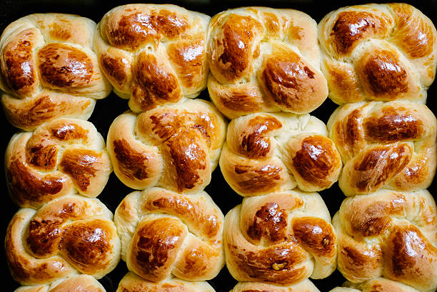 istock Twelve sweet buns perfectly lined in an owen tray 482573824