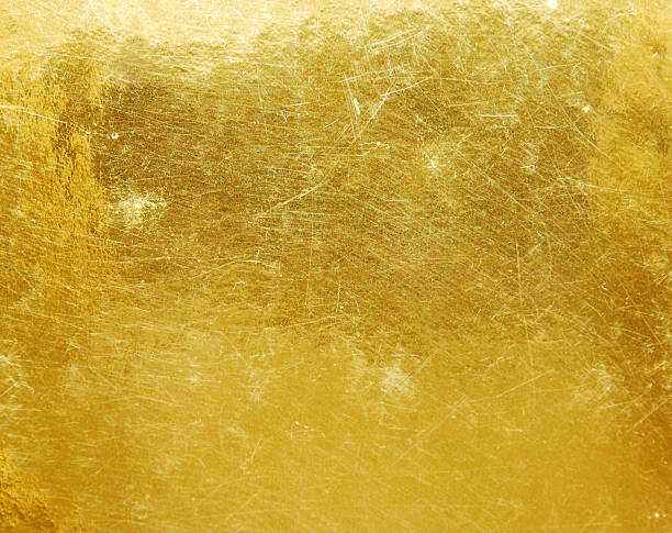 gold background a detail of golden texture gilded stock pictures, royalty-free photos & images