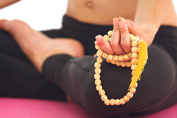 istock Young woman meditating in lotus pose. 482578066