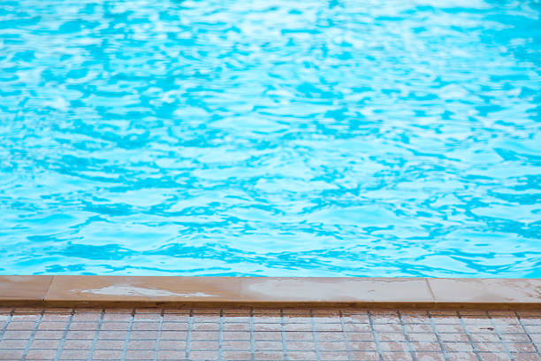 istock Blue swimming pool rippled water 482578394