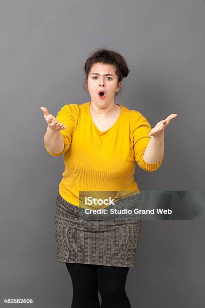 Complaining 20s Fat Woman Denouncing Something Loud Stock Photo - Download Image Now