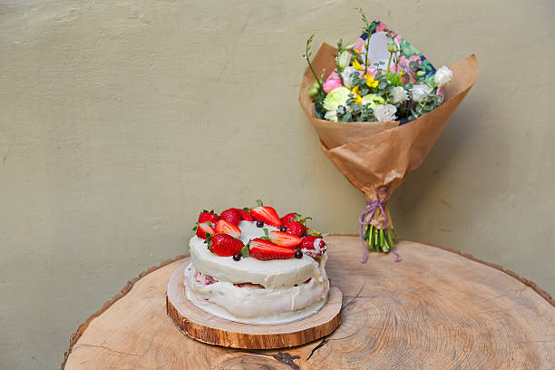 istock Strawberry cake on wooden table 482586154
