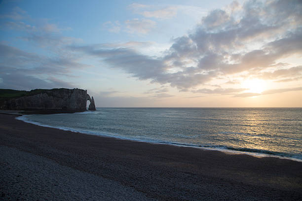 istock Chalk cliffs at Cote d'Albatre during sunset in Etretat, France 482587096