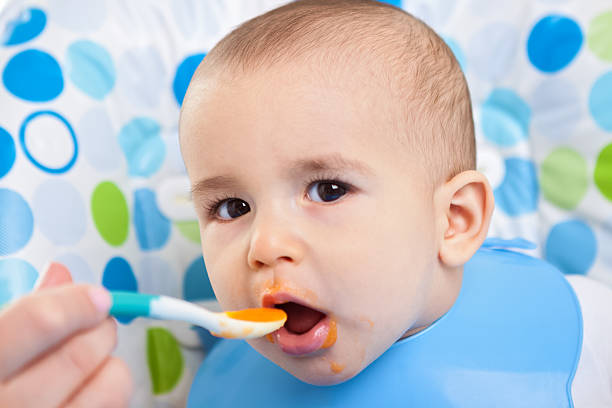 istock Very hungry baby child 482587118