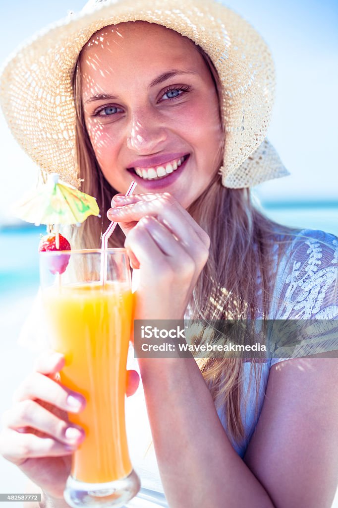 Beautiful blonde woman on a sunny day Beautiful blonde woman on a sunny day at the beach 20-24 Years Stock Photo