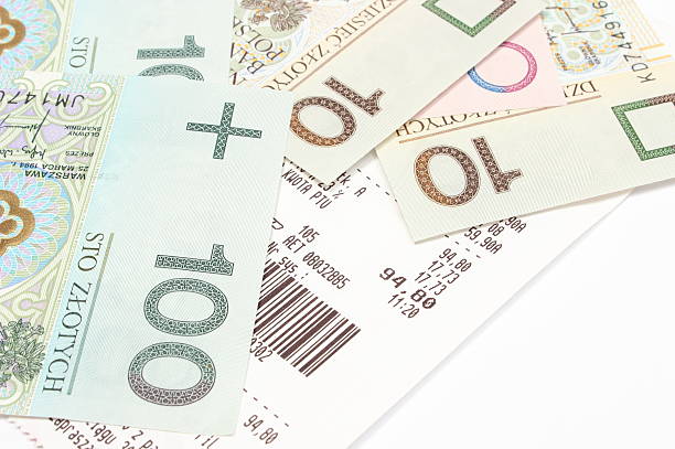 istock Closeup of money with receipt on white background 482588075