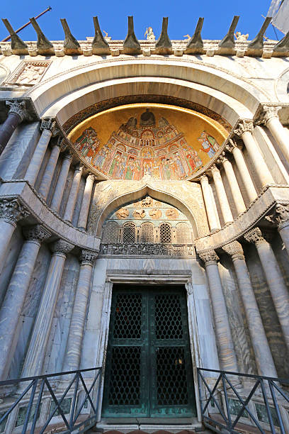 patriarchal cathedral basilica of st. mark in venedig - patriarchal cross stock-fotos und bilder