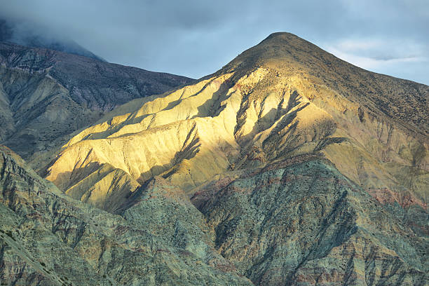 Multicolored mountain neat Purmamarca Multicolored mountain neat Purmamarca village at sunrise, Jujuy province, Argentina achinoam nini photos stock pictures, royalty-free photos & images