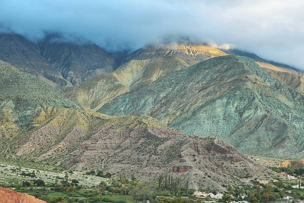 Multicolored mountain neat Purmamarca Multicolored mountain neat Purmamarca village at sunrise, Jujuy province, Argentina achinoam nini photos stock pictures, royalty-free photos & images