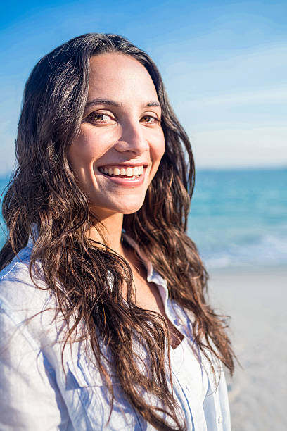 istock Happy woman at the beach 482598204