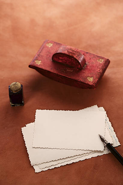 istock vintage ink pot with pen  and retro photographs 482598297