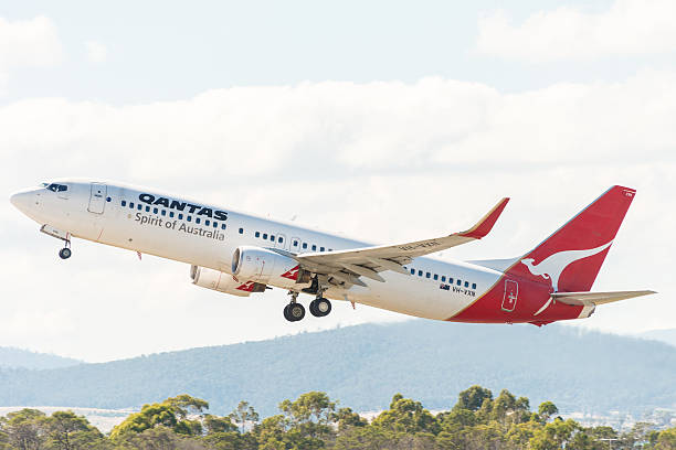 Qantas Australia passenger airliner taking off stock photo