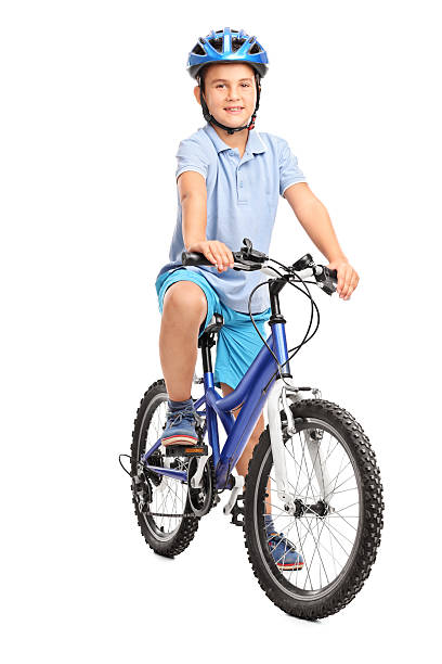 istock Little boy with blue helmet sitting on his bicycle 482599658