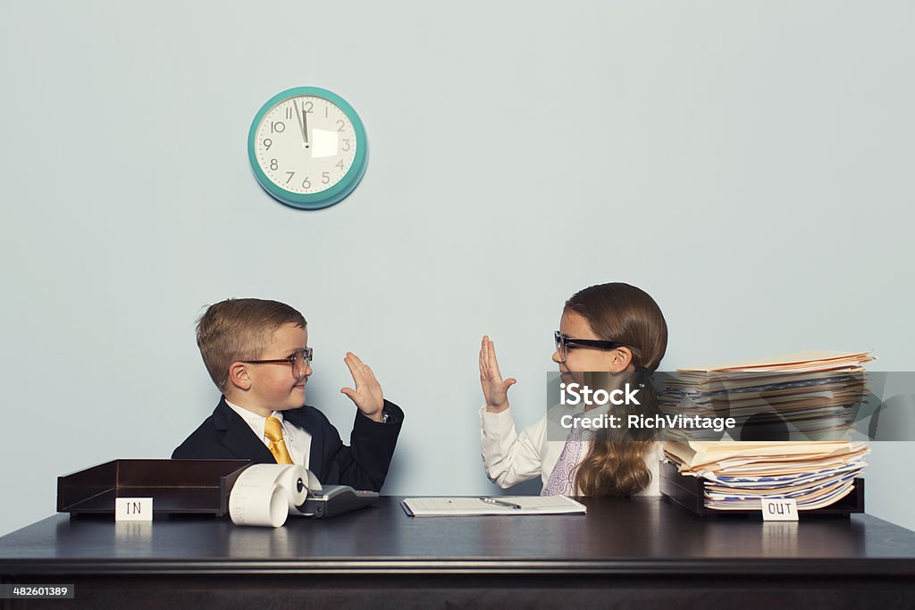 Young Children Business Team Give High Five A young business team's work is done before the deadline. Child Stock Photo