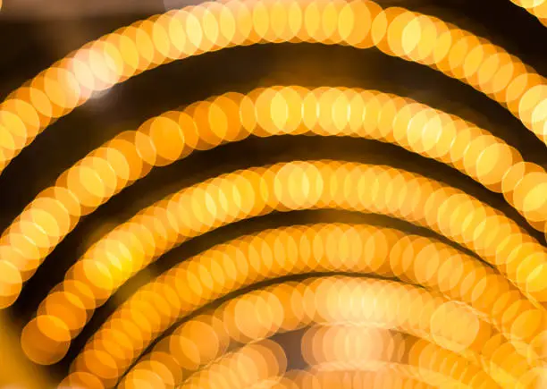 Defocused abstract yellow gold lights christmas arch background
