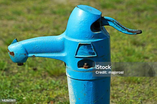 Well On The Street Stock Photo - Download Image Now - Blue, Cast Iron, Closed