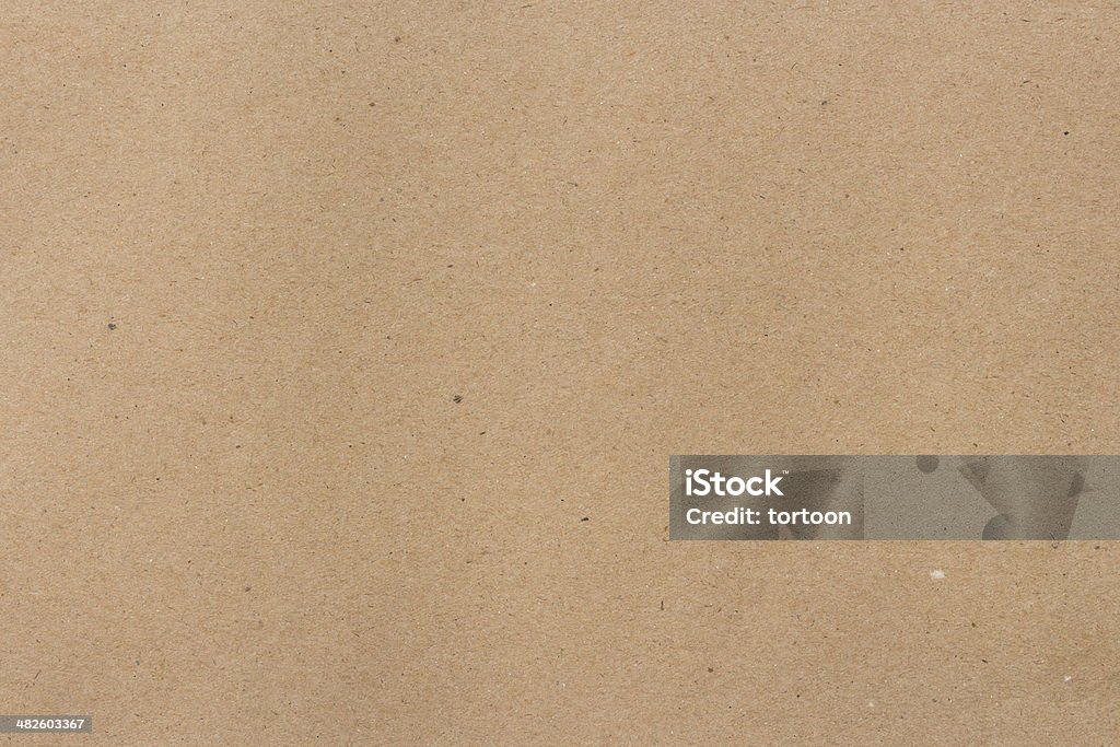 close up brown recycled paper texture background Cardboard Stock Photo