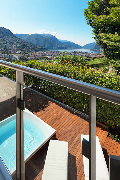 A serene view of a cloudy sky above a white balustrade, evoking tranquility and simplicity. The scene is composed of soft clouds and a clean architectural element, ideal for calming and minimalist designs.