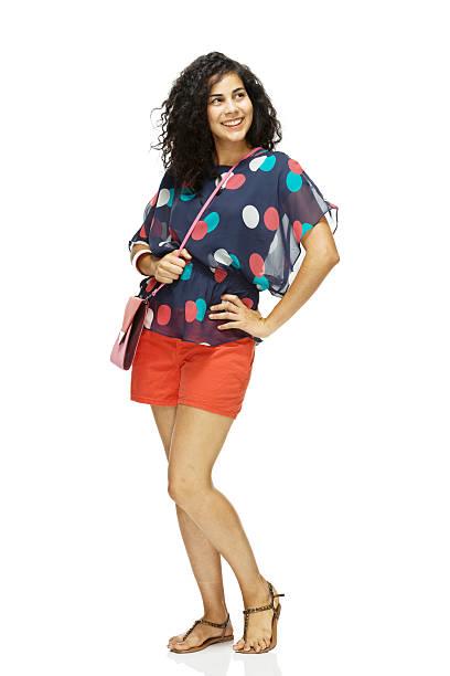 istock Happy young woman standing 482603607