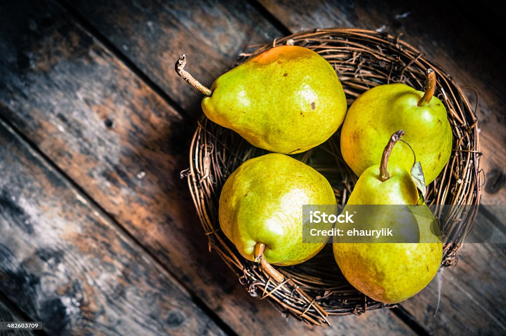 Pears on rustic wooden background Agriculture Stock Photo