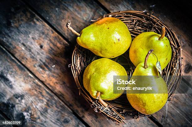 Pears On Rustic Wooden Background Stock Photo - Download Image Now - Agriculture, Autumn, Basket