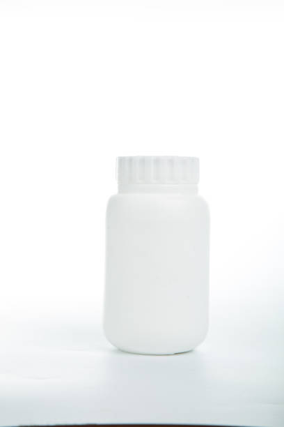istock Pills and drug container isolated 482603738